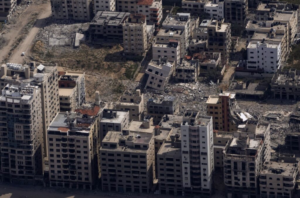 destroyed buildings are seen u.s. air force overflying the gaza strip 1